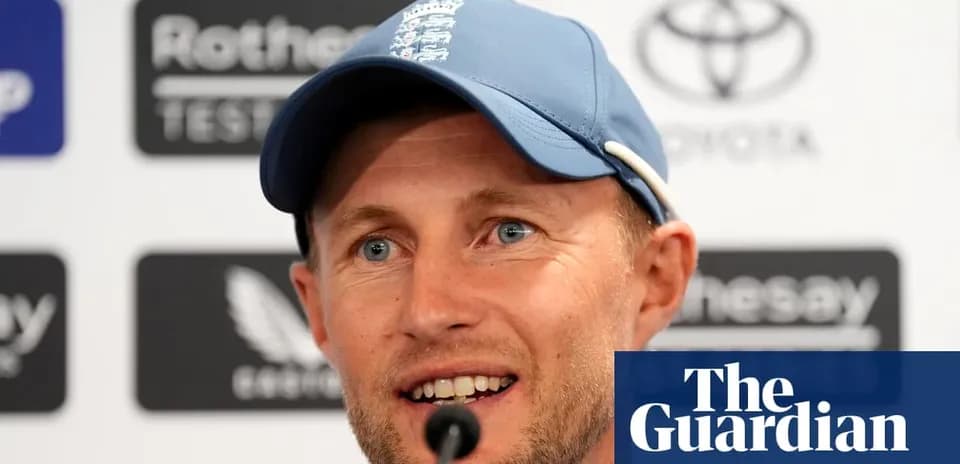 Cricketer at press conference with sponsor logos
