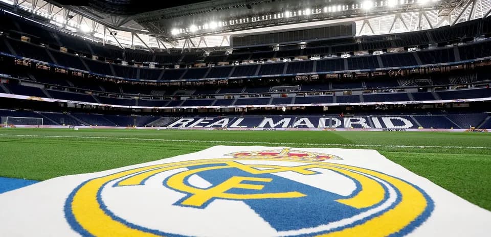 Real Madrid logo on the pitch at stadium