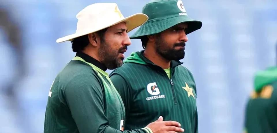 Two Pakistan cricket players discussing during practice