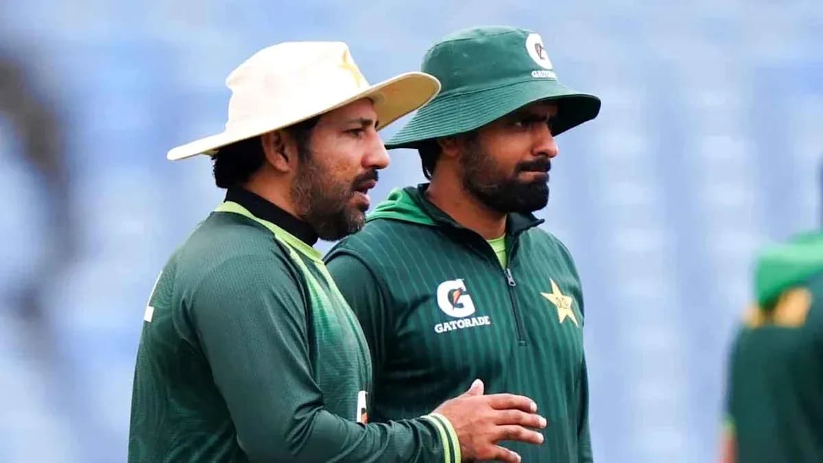 Two Pakistan cricket players discussing during practice