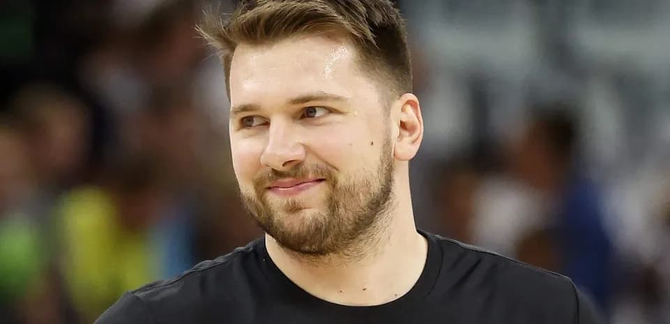 Player smiling during warm-up on basketball court