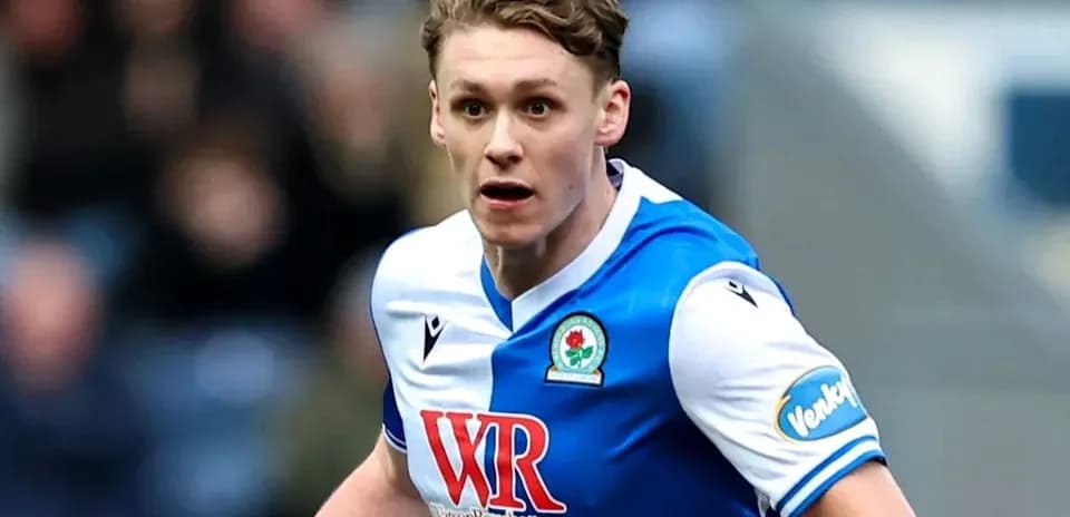 Player in Blackburn Rovers kit during match action