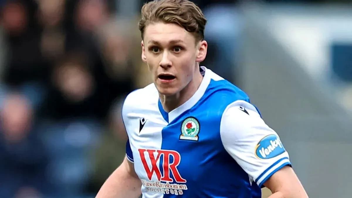 Player in Blackburn Rovers kit during match action