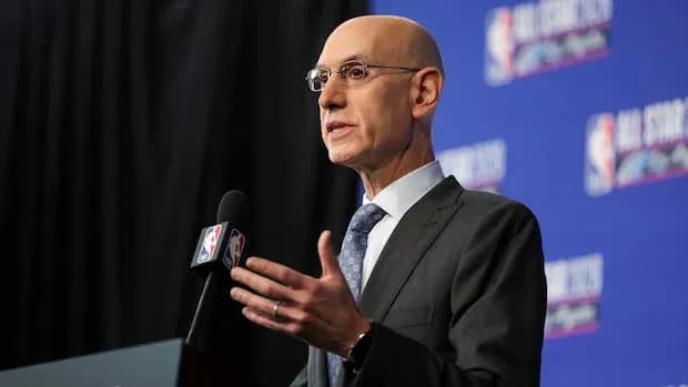 NBA commissioner speaking at press conference podium