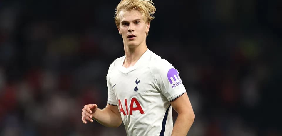 Tottenham player running during a match