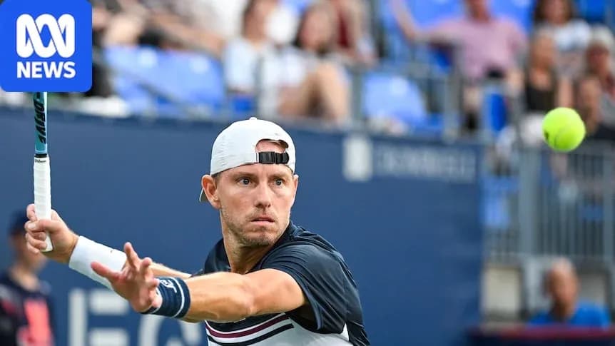 Tennis player hitting a forehand during match