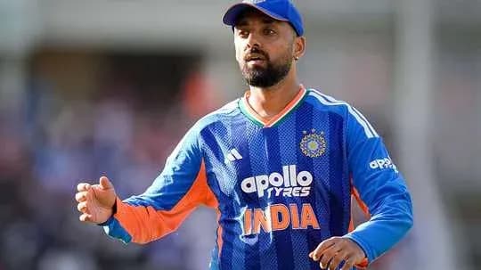 Cricketer in blue India jersey on field