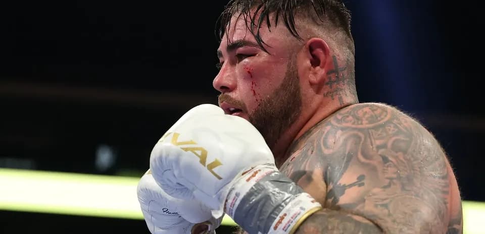 Boxer with tattoos preparing for a fight