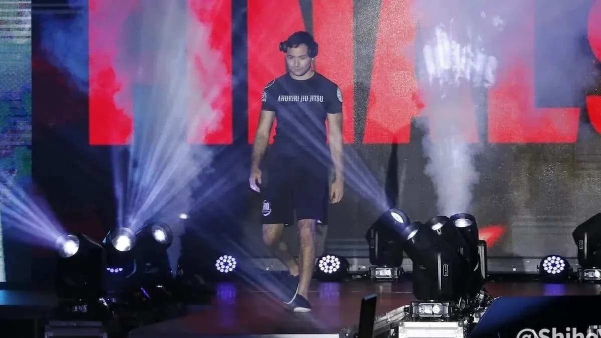 Athlete walking to the finals stage with lights