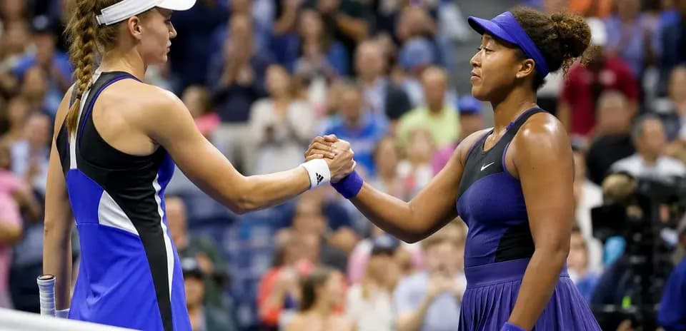 Players shaking hands after tennis match at US Open