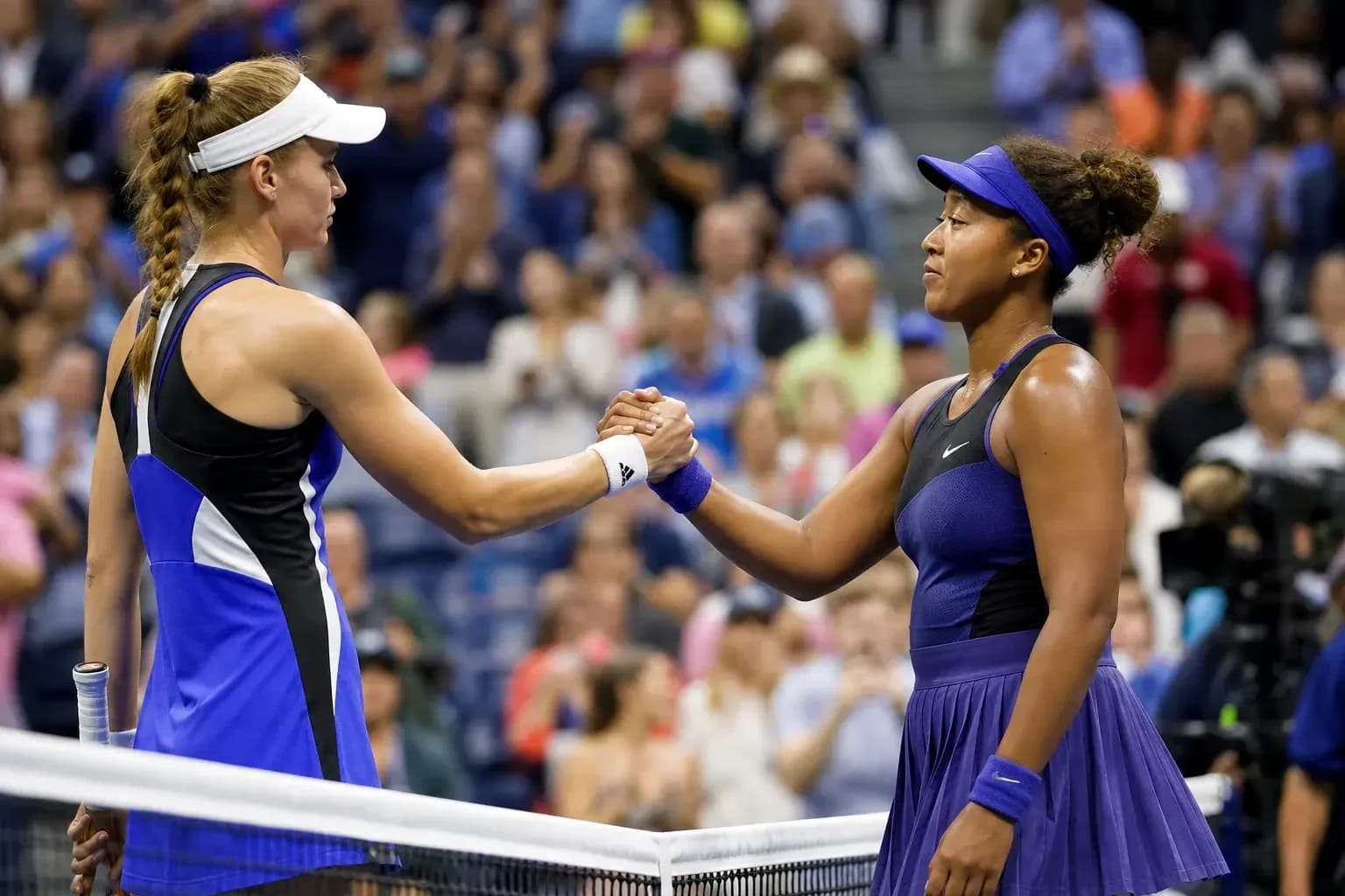 Players shaking hands after tennis match at US Open