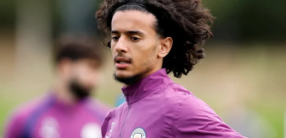 Player training in Manchester City kit on field