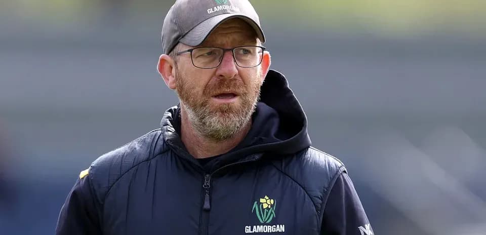 Coach wearing Glamorgan attire on the field