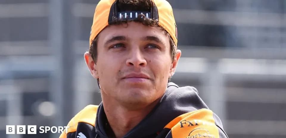Driver wearing McLaren team gear at track