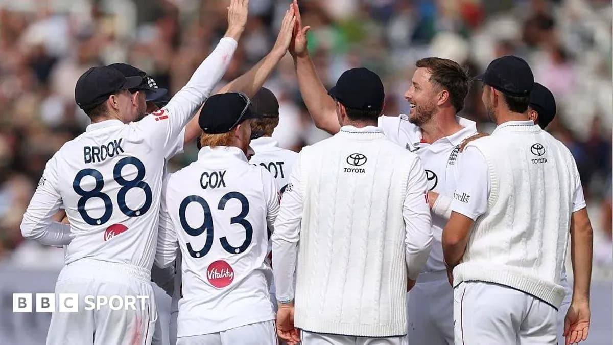 Cricket team celebrating a wicket during match