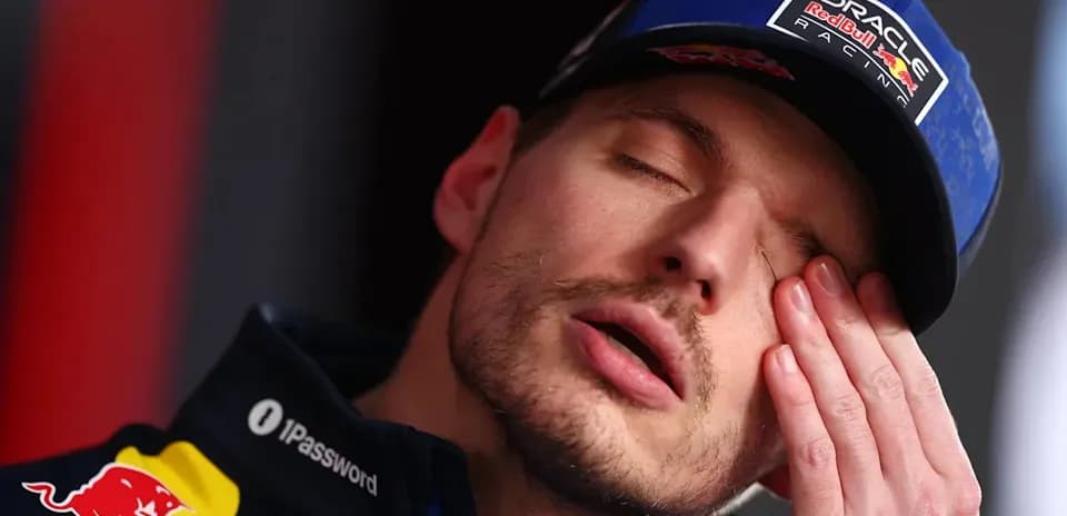 Driver resting with eyes closed during press event