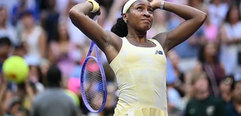 Coco Gauff celebrating after winning a match