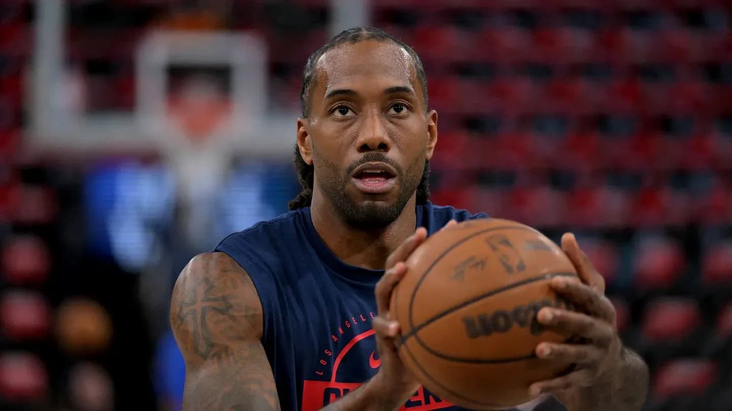 Player practicing free throws before the game