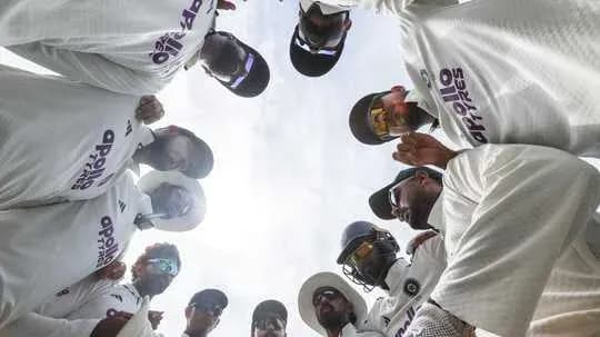 Cricket team huddled together before the match