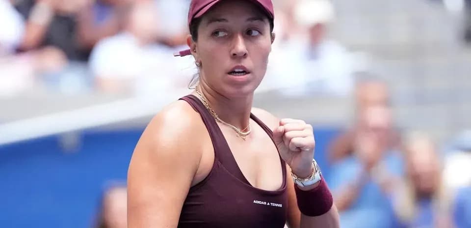 Tennis player celebrating during a match
