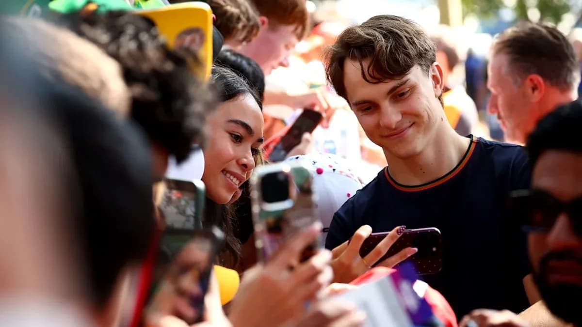 Two fans taking a selfie at an event