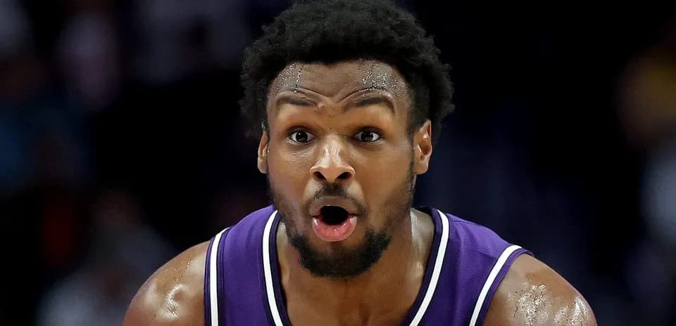 Basketball player in purple jersey during game
