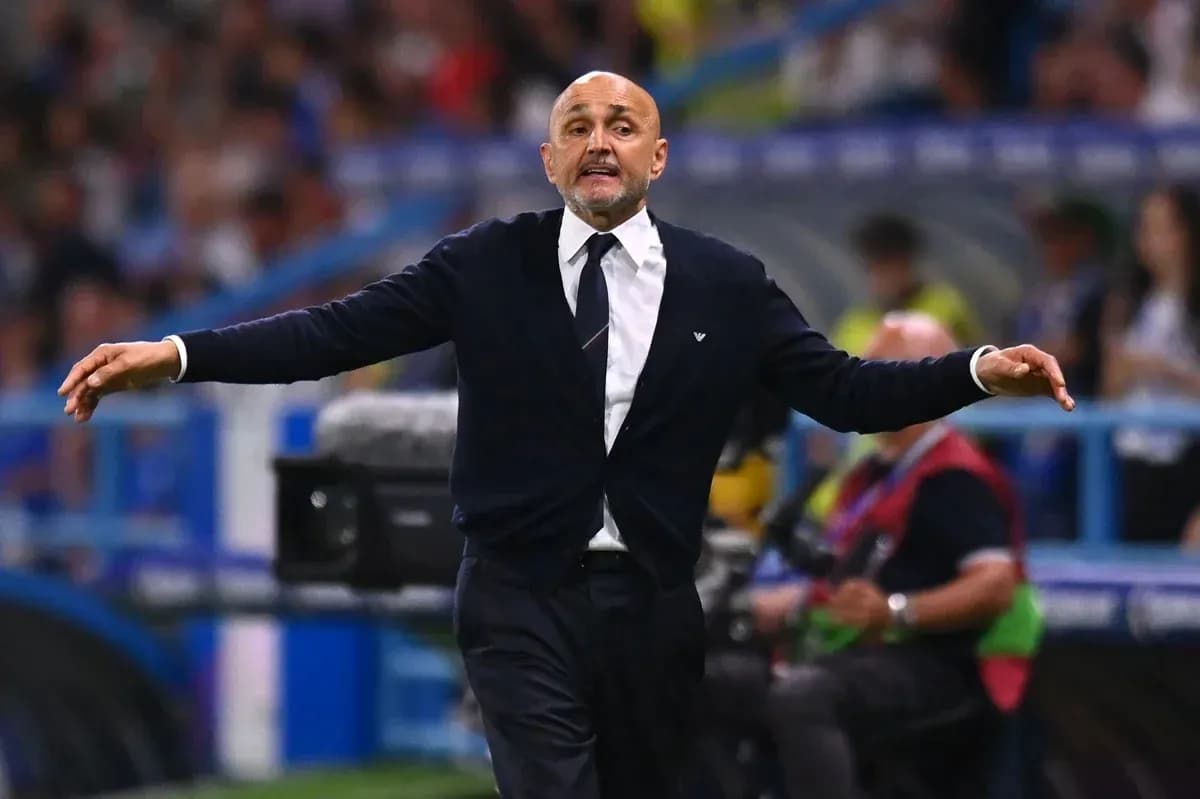 Coach gesturing on the sideline during match