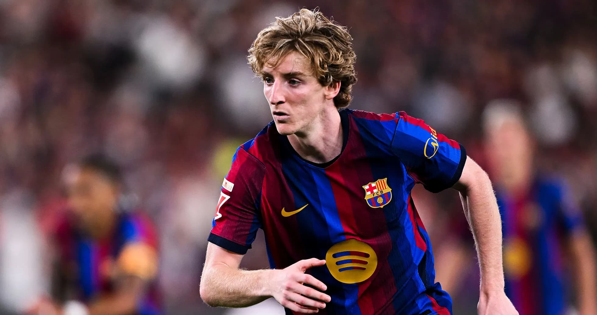 Player in Barcelona kit running during match