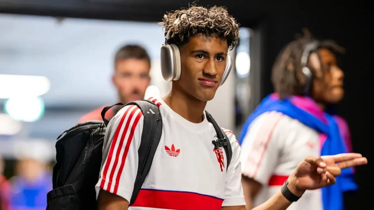 Player wearing headphones entering locker room