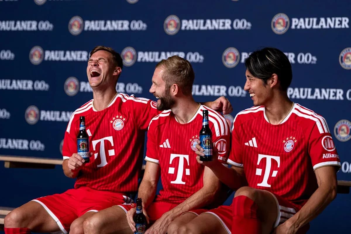Bayern Munich players posing with drinks during photoshoot
