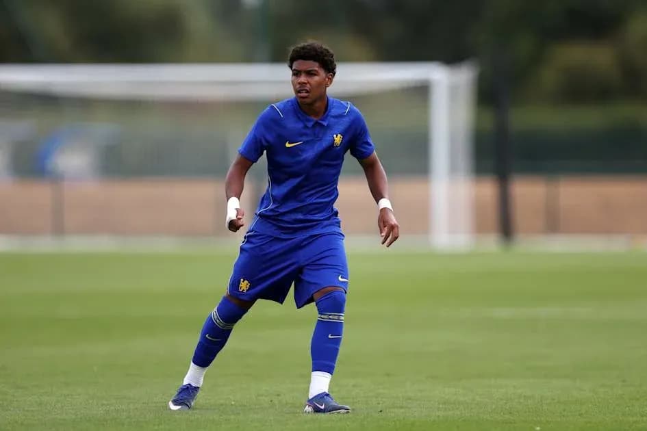 Player in blue kit training on the pitch