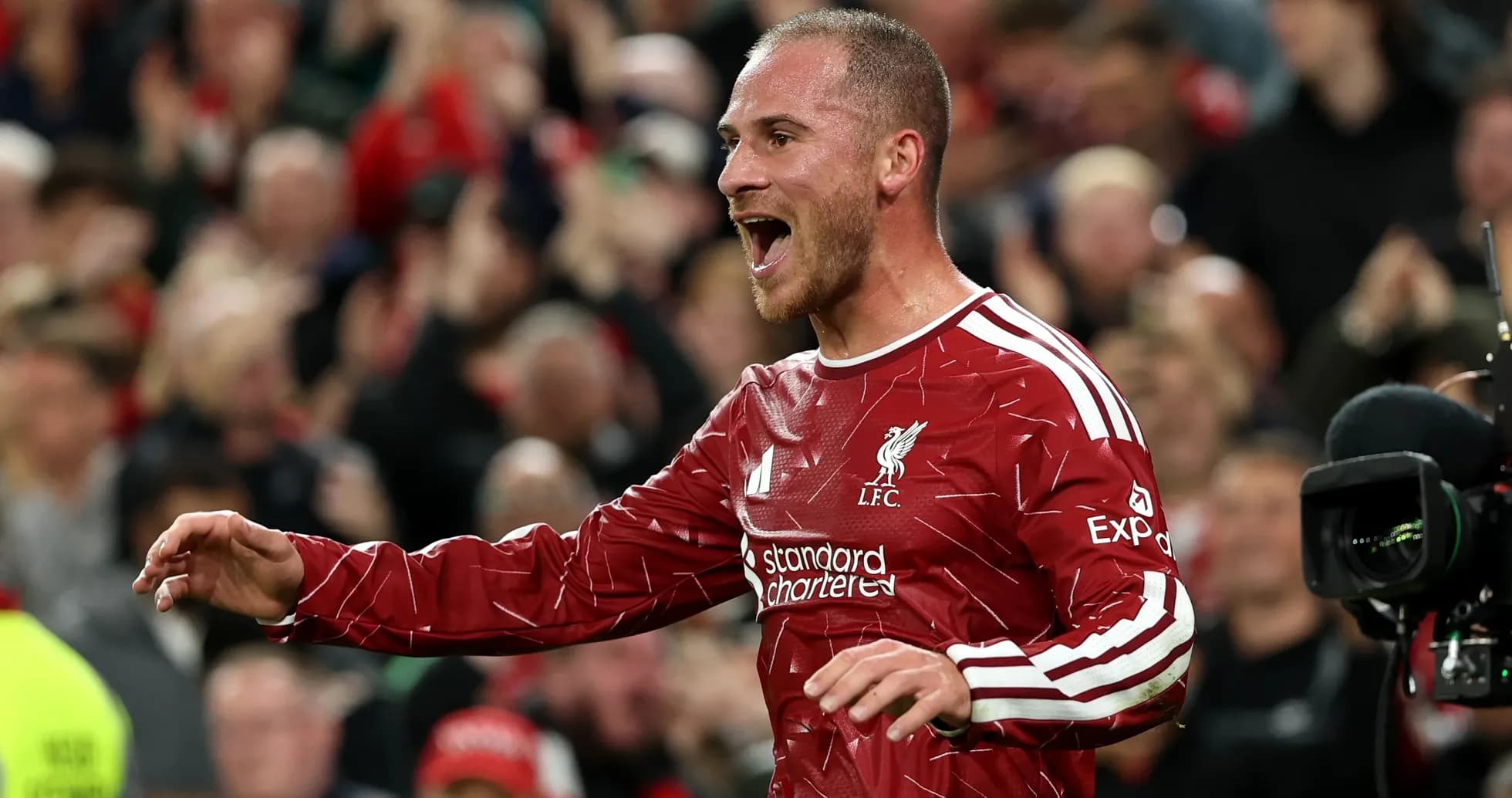 Player celebrating a goal for Liverpool at Anfield