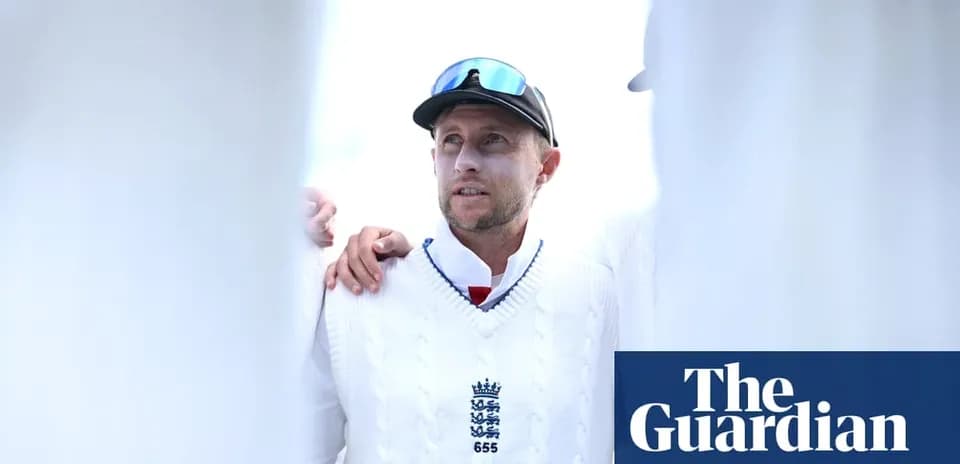 Cricketer wearing a sweater during team huddle