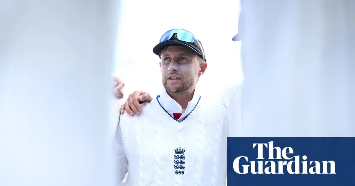 Cricketer wearing a sweater during team huddle