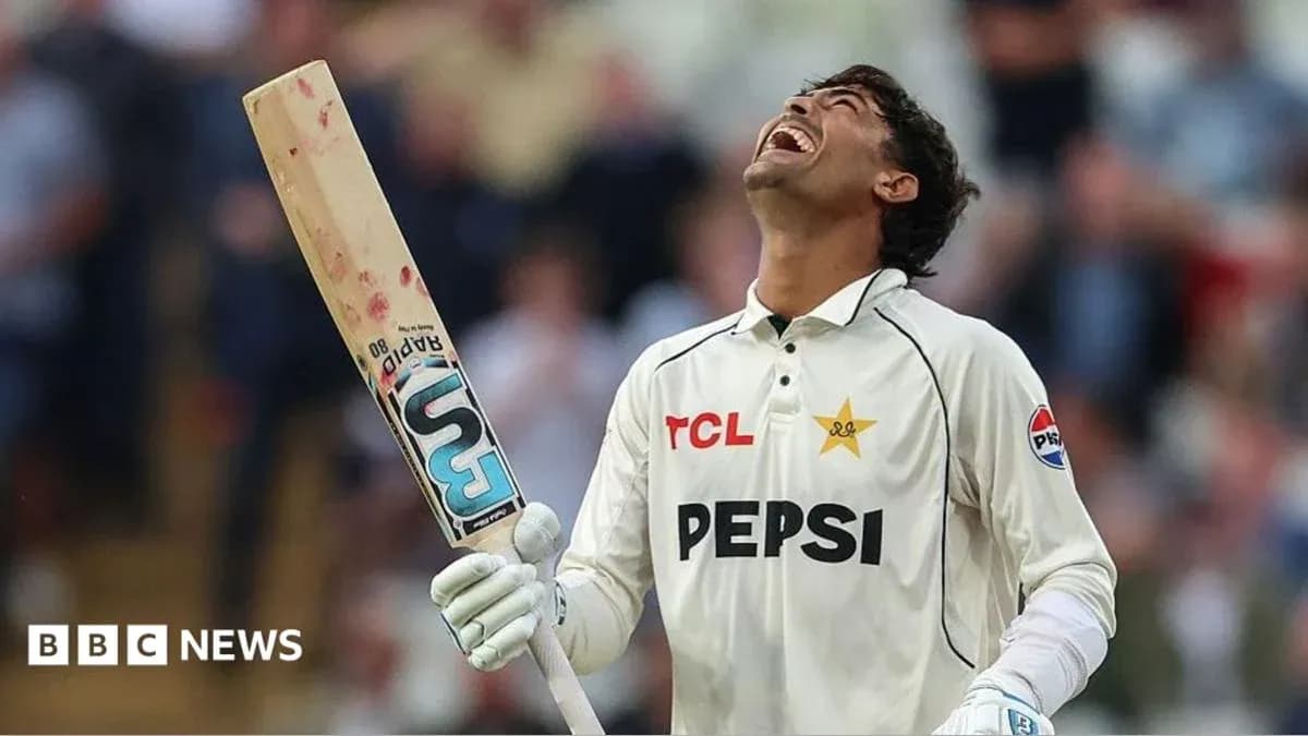 Cricketer celebrating with bat after scoring runs