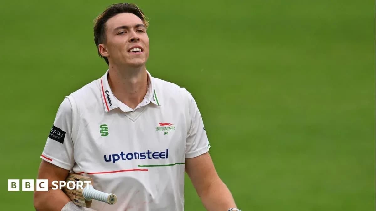 Cricketer walking off the field after batting