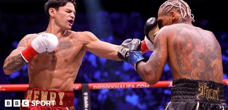 Boxer delivering a punch during a match