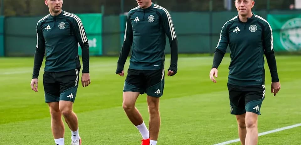 Three players walking during training session