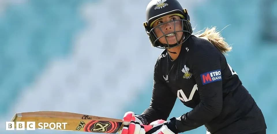 Batter preparing to hit ball during cricket match