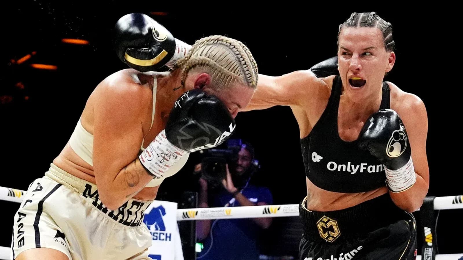 Boxers exchanging punches in a match