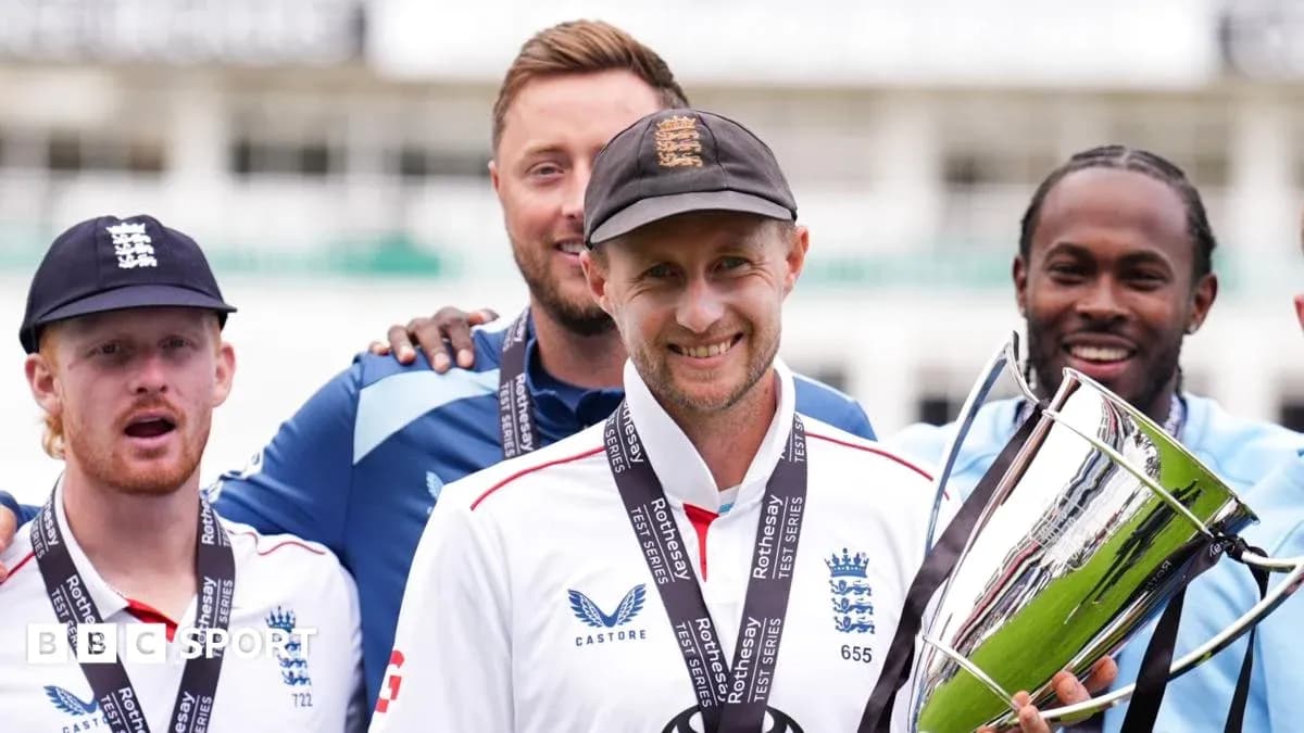 England cricket team celebrating with trophy after victory