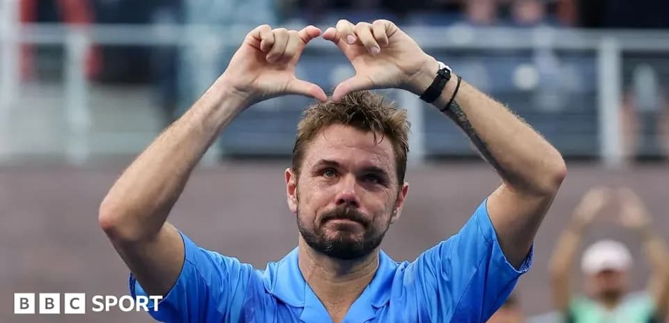 Player making heart gesture after match victory