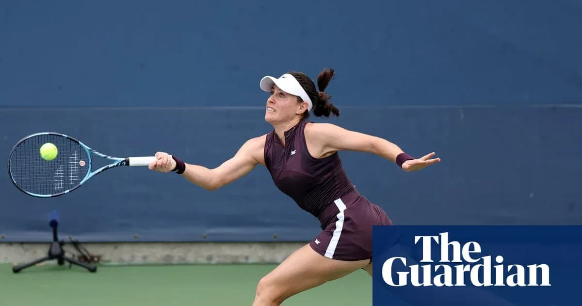 Female tennis player hitting a ball during match