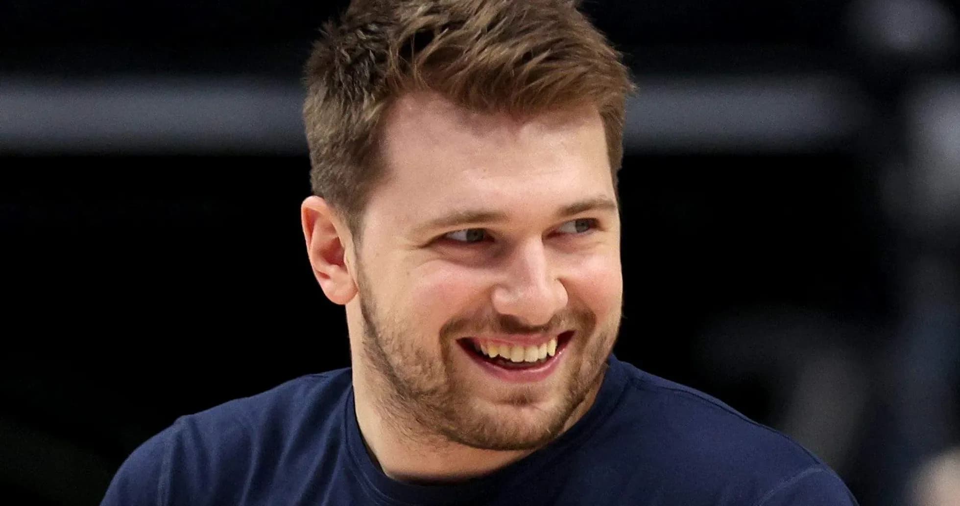 Player smiling during warm-up before basketball game