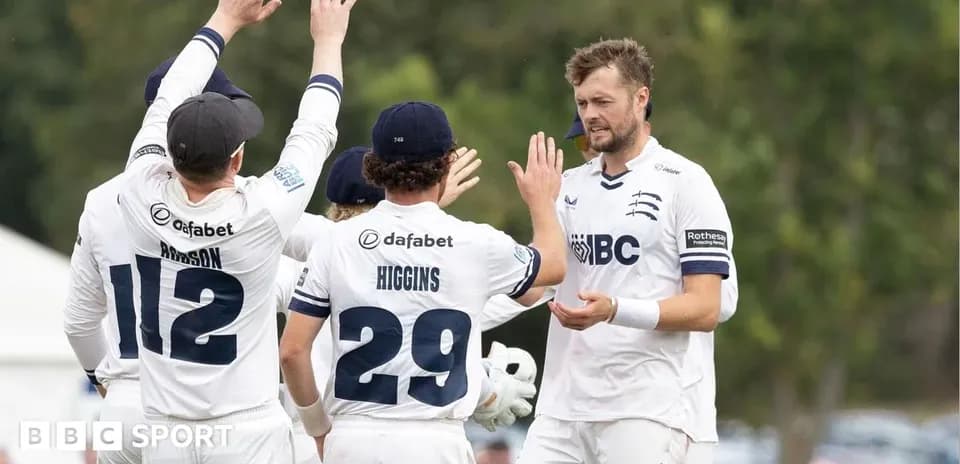 Middlesex players celebrating a wicket during match