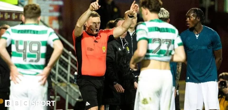 Referee signaling during a football match incident