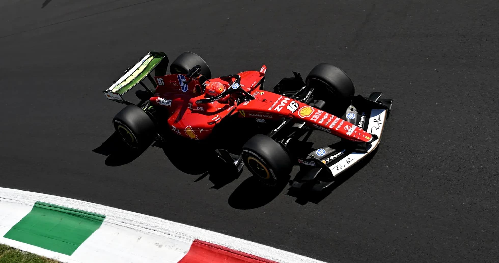Ferrari car driving on track during race