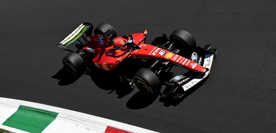 Ferrari car driving on track during race