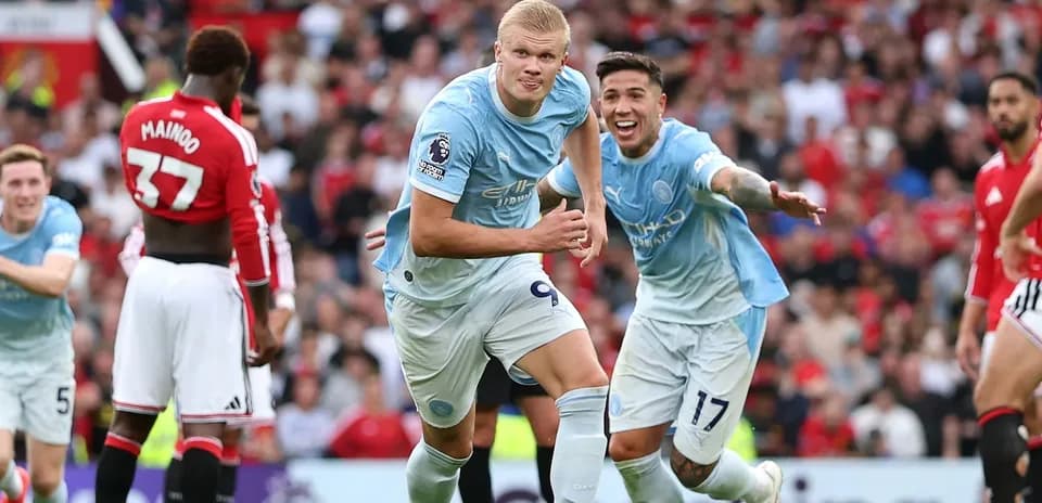Manchester City players celebrating a goal during match