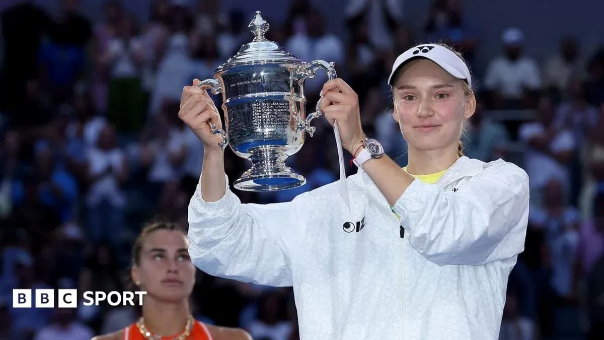 Player holding trophy after winning the match